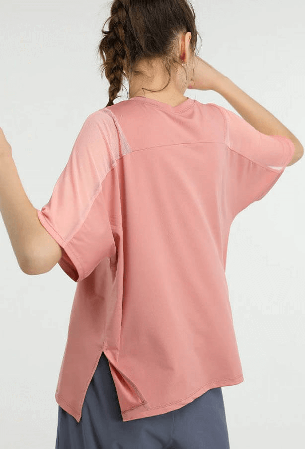Back view of a pink loose running mesh short sleeves t-shirt for women, perfect for workouts like running, cycling, and dancing - SF0044